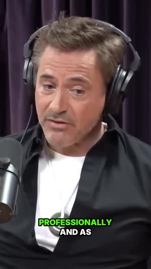 Robert Downey Jr. mid-expression, captioned vertical clip
